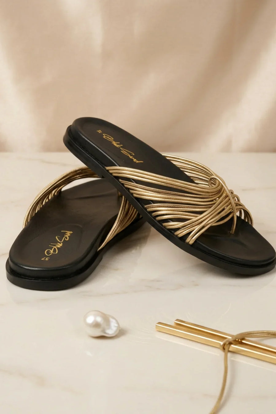 Oro Intrecciato Slide